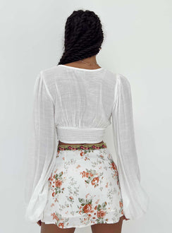 back view of model wearing Princess Polly Castlereagh Top White Full Sleeves Plunger 