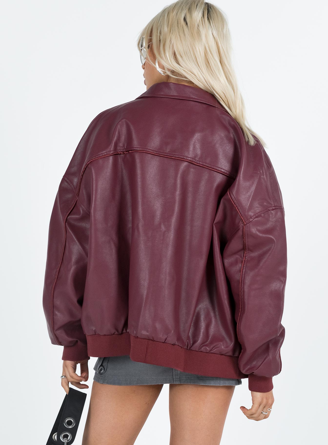 Burgundy bomber jacket Faux leather material  Classic collar  Zip front fastening  Ribbed waistband and cuffs  Twin hip pockets