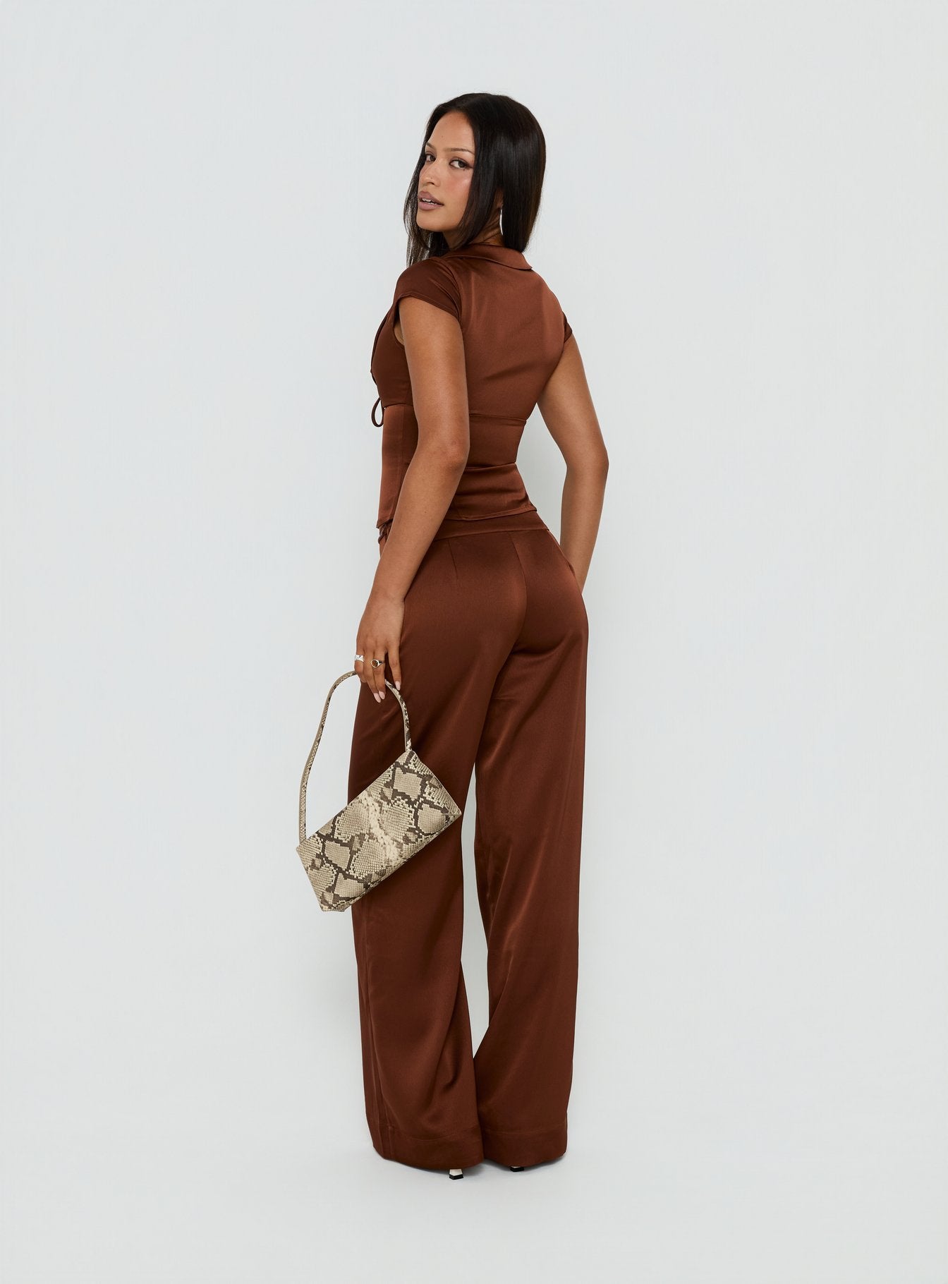 Presenting the Aubrette Satin Tie Pants Chocolate womens-regular-pants in high-rise wide-leg style back view of model wearing Princess Polly