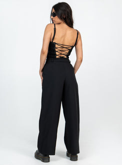 Front view of model wearing  front Princess Polly High Waisted Pants High Waisted Pants High Waisted Pants High Waisted Pants High Waisted Pants High Waisted Pants High Waisted Pants High Waisted Pants High Waisted Pants High Waisted Pants High Waisted Pants  Archer Pants Black Petite