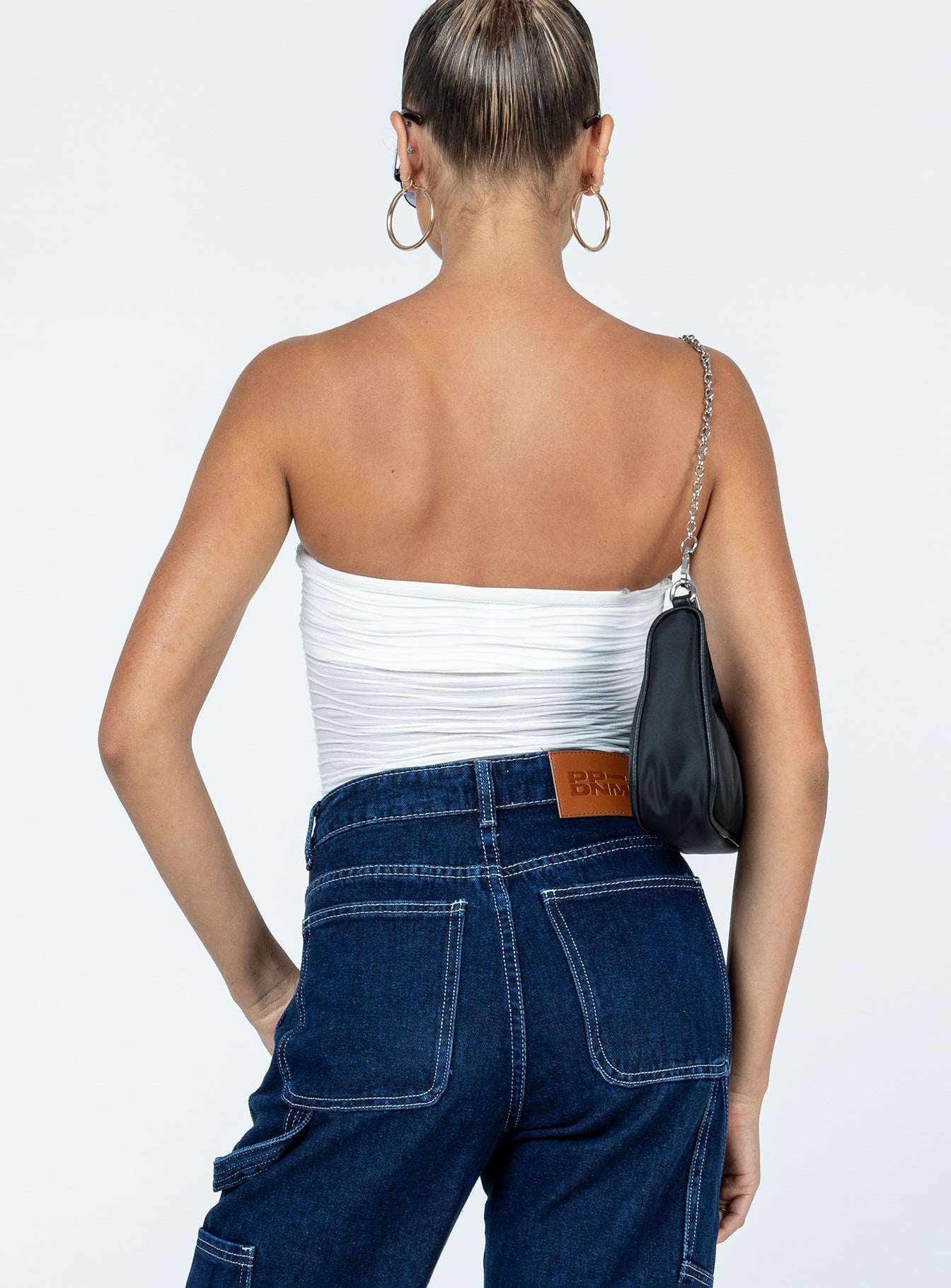 back view of model wearing Princess Polly Makena Strapless Bodysuit White Low Impact Sleeveless 