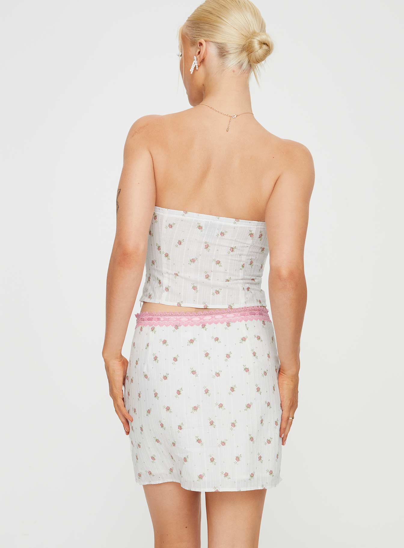 Pink and white floral mini skirt