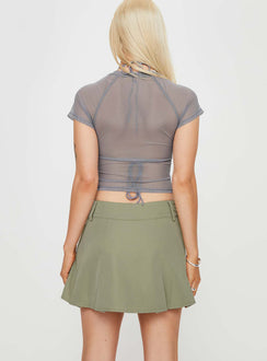 Green Mini skort Belt looped waist zip and button front fastening pleated hem built in shorts
