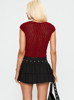 back view of model wearing Princess Polly Fire Sign Studded Tiered Mini Skirt Black Mini Skirts 