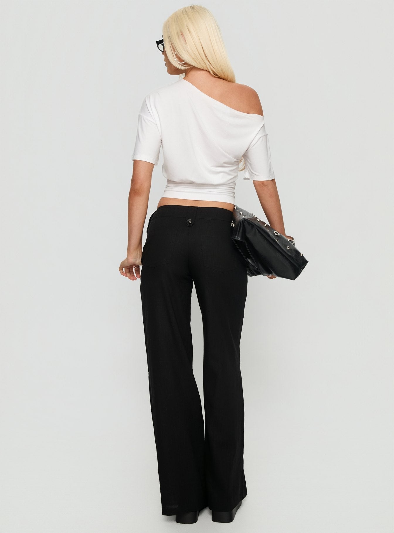 back view of model wearing Princess Polly Pedra Wide Leg Pant Black Mid Rise Pants 