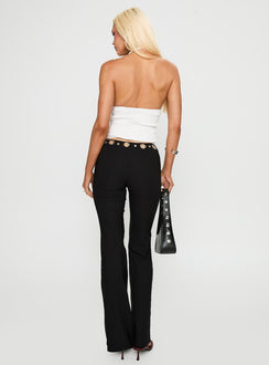 back view of model wearing Princess Polly True Grit Eyelet Flare Pants Black Low Rise Pants 