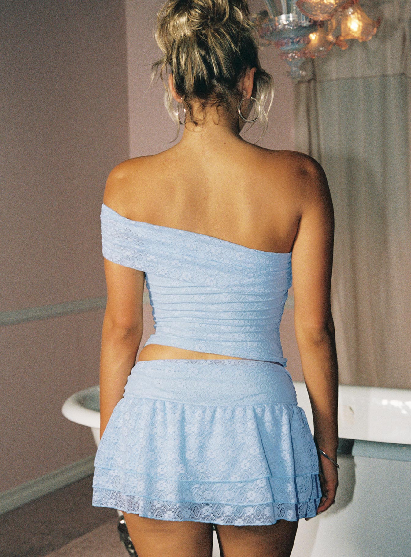back view of model wearing Princess Polly Believe In Paradise Mesh Mini Skort Blue Low Rise Shorts 