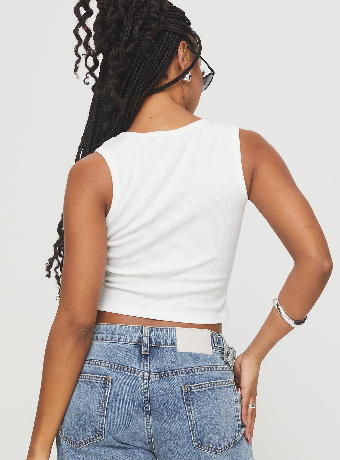 back view of model wearing Princess Polly Somer Top White Sleeveless Scoop Neck 