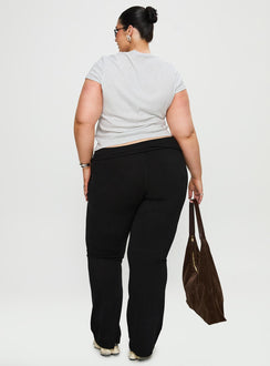 back view of model wearing Princess Polly Movement Yoga Pant Black Curve High Waisted Pants 