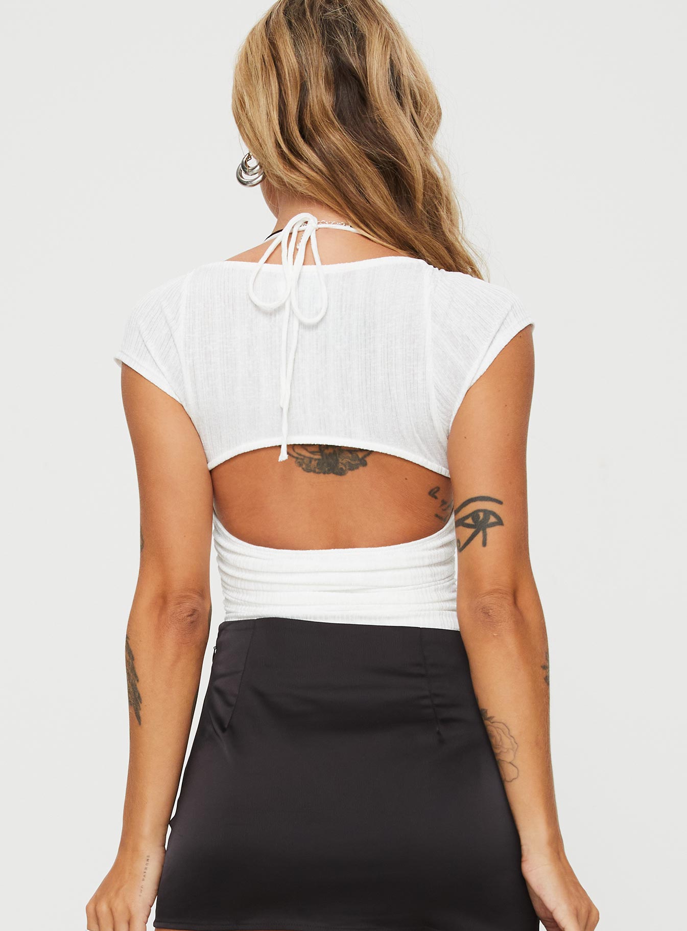 Bodysuit Halter tie fastening, cap sleeve, ruched bust, tie fastening at front, cheeky style bottom, press clip fastening