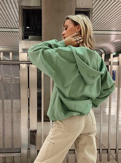 back view of model wearing Princess Polly Calder Zip Hooded Green Cropped 