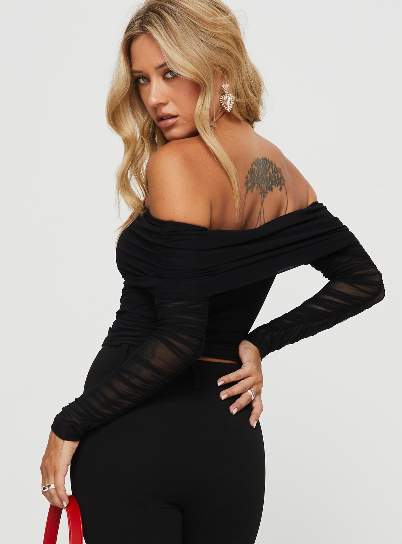 back view of model wearing Princess Polly Rosenfield Off The Shoulder Top Black Full Sleeves straight 