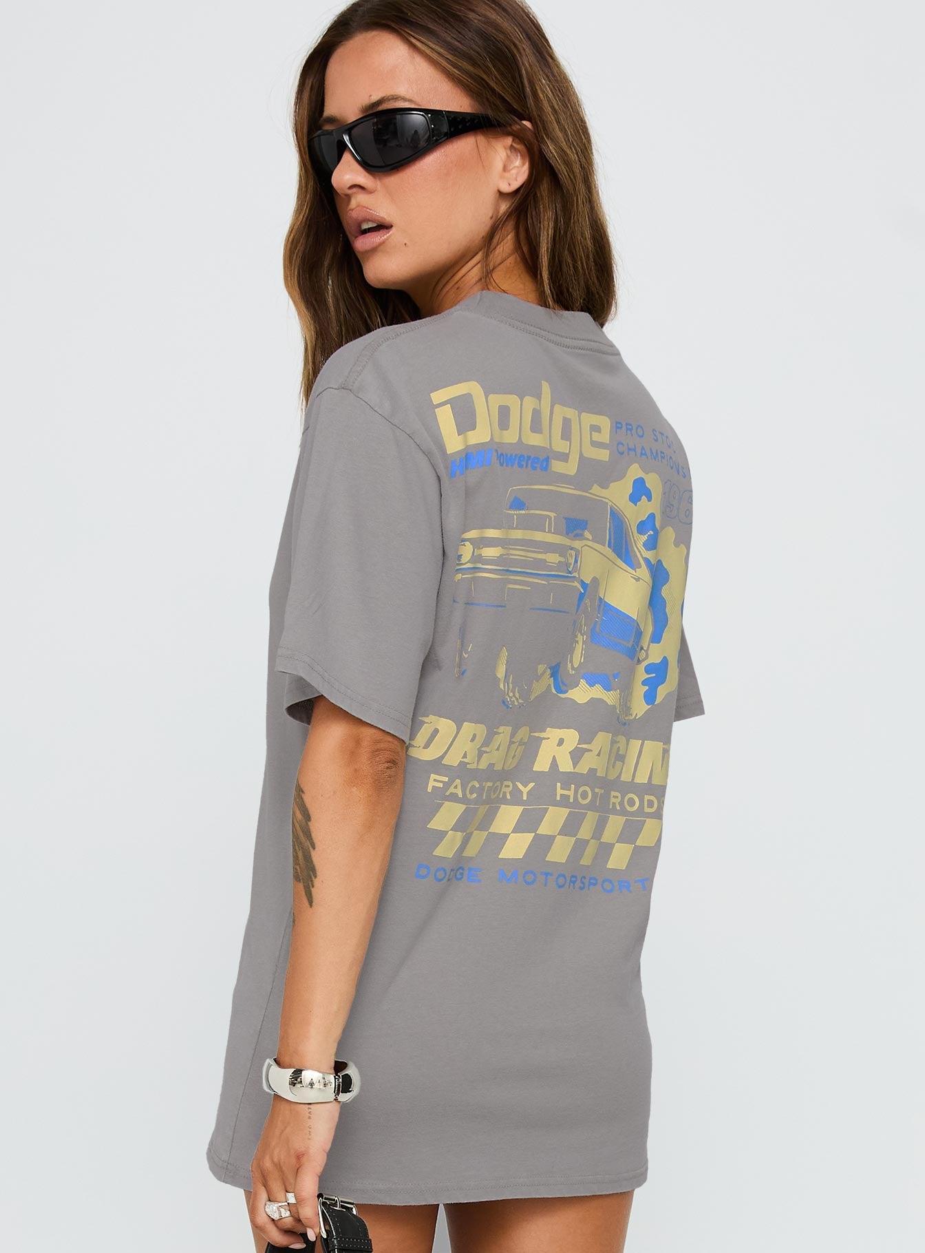 back view of model wearing Princess Polly Dodge Racer Oversized Graphic Tee Grey Half Sleeves Crew Neck 