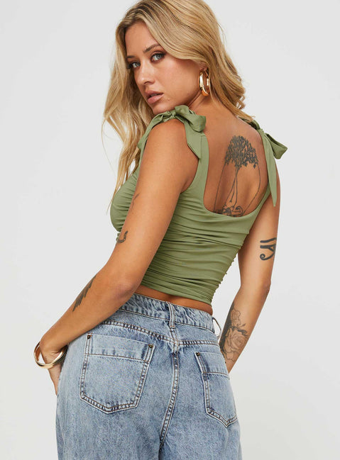 back view of model wearing Princess Polly Ashling Top Green Sleeveless Square Neck 