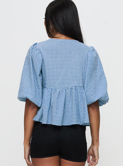 back view of model wearing Princess Polly Full House Tie Up Blouse Top Blue Plaid Half Sleeves Crew Neck 