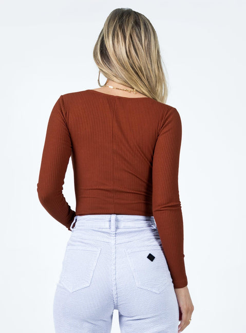 Bodysuit Ribbed material  Scooped neckline  Button front fastening  Brief cut bottom  Press clip fastening at base 