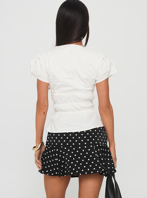 Vanish Mini Skort Black Polka