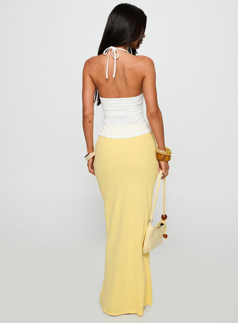 back view of model wearing Princess Polly Jodie Maxi Skirt Lemon Yellow Maxi Skirts Skirts 