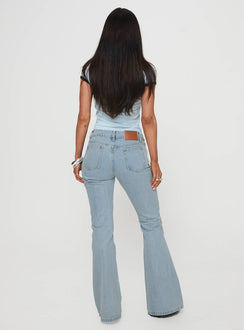 back view of model wearing Princess Polly Echovalley Low Rise Jeans Light Wash Mid Rise 