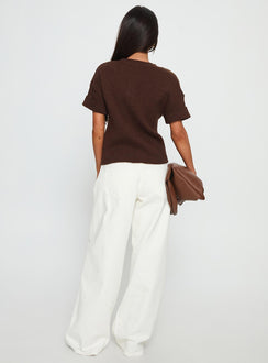 back view of model wearing Princess Polly Ramos Low Rise Wide Leg Jeans White Low Rise Jeans 