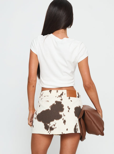 back view of model wearing Princess Polly Maxa Denim Mini Skirt Cow Print Mini Skirts 