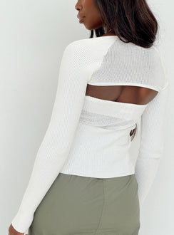 Two piece top Knit material Strapless tube top Matching long sleeve bolero Good stretch Unlined 