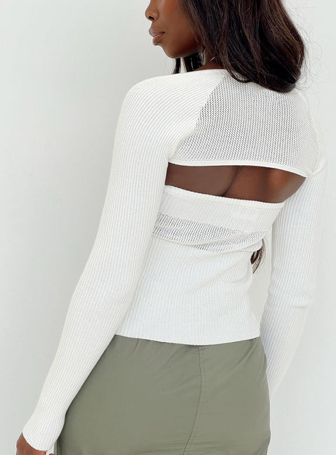 Two piece top Knit material Strapless tube top Matching long sleeve bolero Good stretch Unlined 