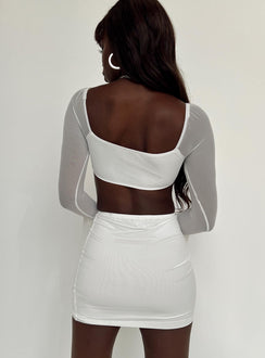 Matching set Mesh material  Long sleeve crop top  Wired cups  High waisted mini skirt  Elasticated waistband  Good stretch  Lined body  Sheer sleeves 