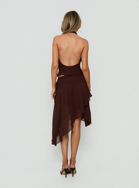 Showcasing the Evaleine Asymmetrical Chiffon Midi Skirt in Chocolate womens-skirts back view of model wearing Princess Polly