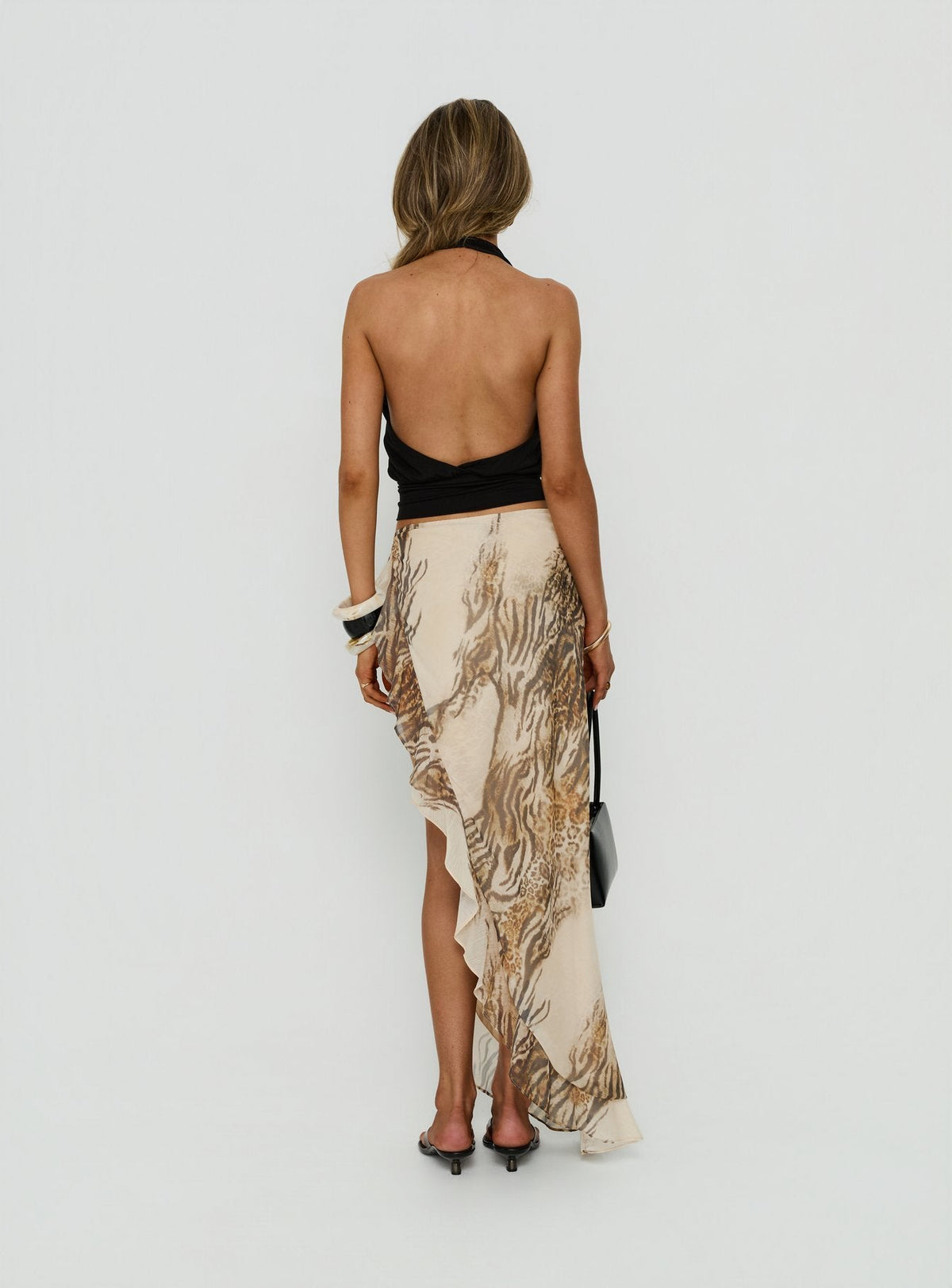 Displaying the Argenzia Sarong Maxi Skirt Animal Multi in womens-skirts with maxi length back view of model wearing Princess Polly