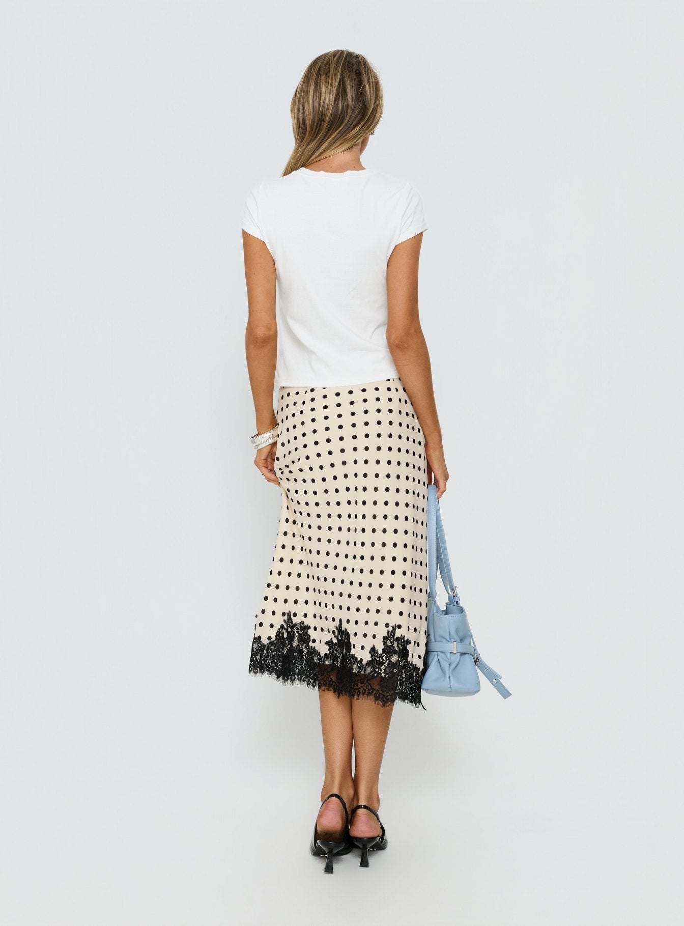 back view of model wearing Princess Polly Downtown Scene Lace Trim Maxi Skirt Cream Polka Midi Skirts 