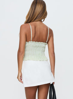 back view of model wearing Princess Polly Essentially Skort White Petite High Waisted Shorts 