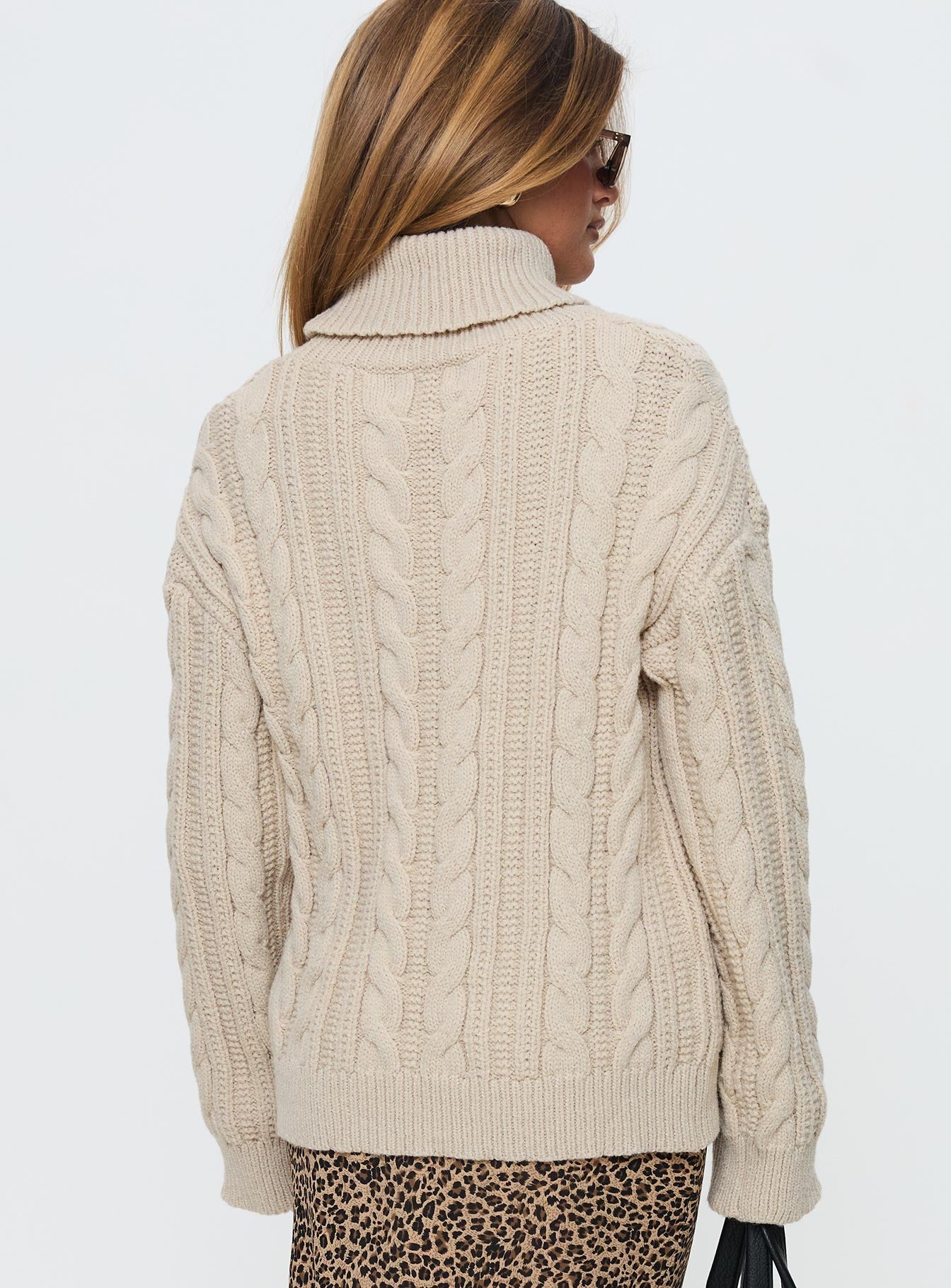 back view of model wearing Princess Polly Bryden Turtleneck Cable Knit Sweater Beige Long 
