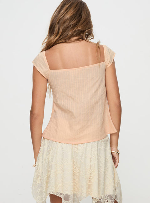 back view of model wearing Princess Polly Lunya Cap Sleeve Top Beige Short Sleeves Plunger 