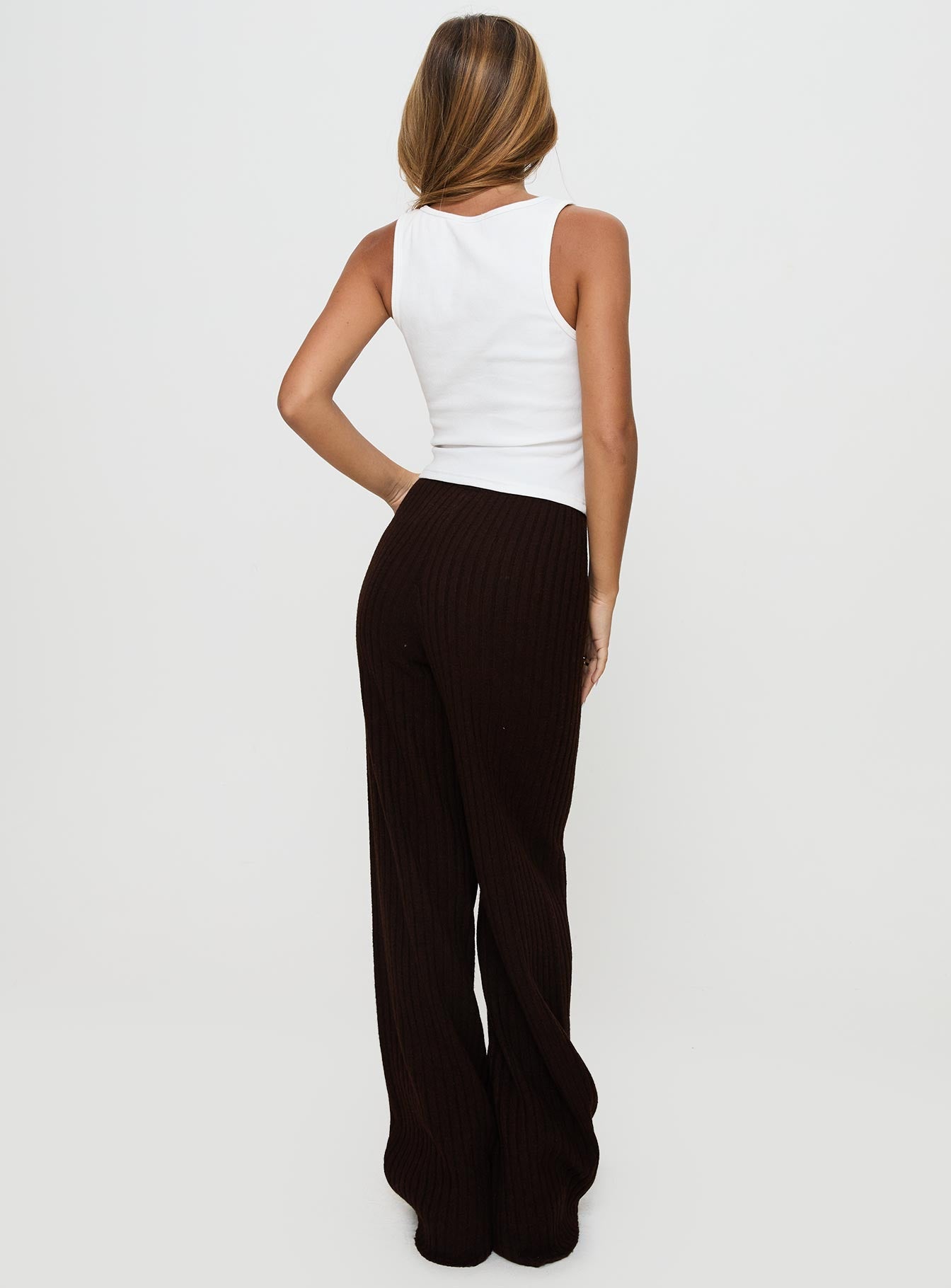 back view of model wearing Princess Polly Montana Knit Pants Chocolate Brown High Waisted Pants 