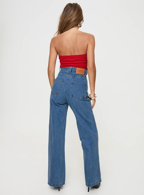 back view of model wearing Princess Polly Zephee Wide Leg Jeans Light Wash Tall High Waisted 