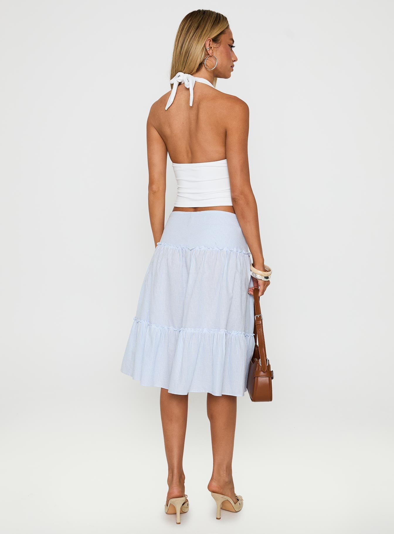 back view of model wearing Princess Polly Cascades Low Rise Midi Skirt Blue / White Stripe Midi Skirts 