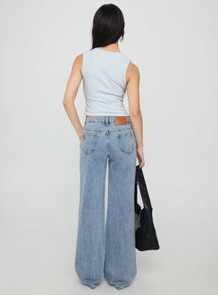 back view of model wearing Princess Polly Kadison Low Rise Straight Leg Jeans Mid Wash Blue Low Rise Jeans 