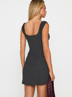 back view of model wearing Princess Polly Joseleine Mini Dress Black / Polka Scoop Neck 