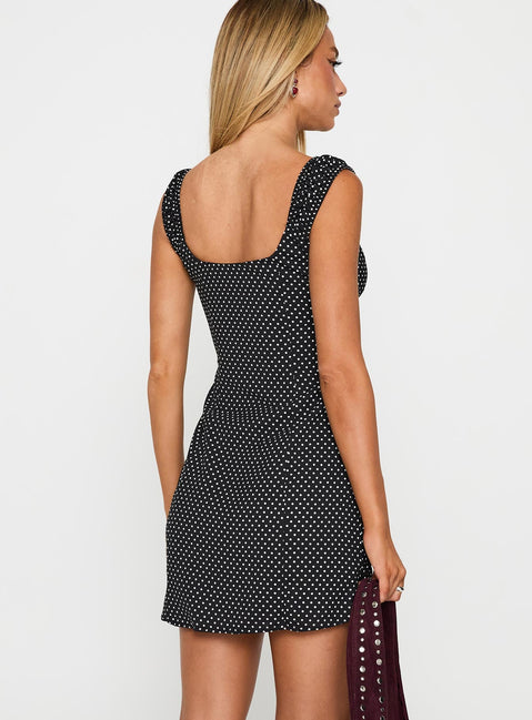 back view of model wearing Princess Polly Joseleine Mini Dress Black / Polka Scoop Neck 