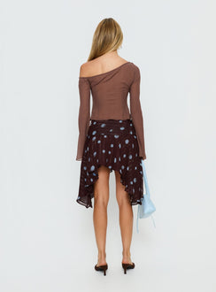 back view of model wearing Princess Polly Hevenna Asymmetrical Chiffon Mini Skirt Brown / Blue Polka 