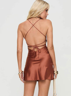 Mini dress Satin material, v neckline, adjustable straps with tie detail at back, invisible zip fastening at side Non-stretch material, lined bust