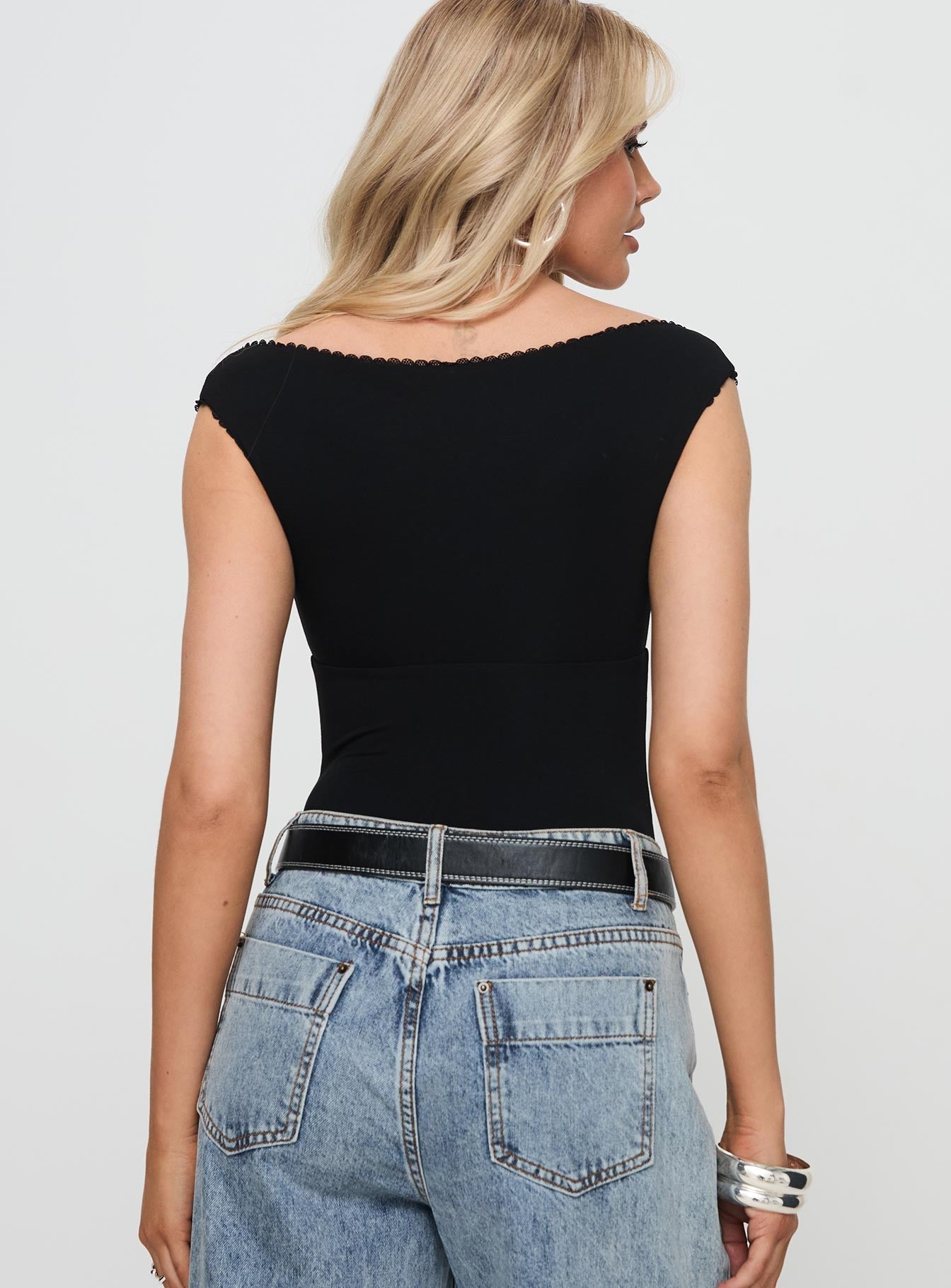 back view of model wearing Princess Polly Faure Bodysuit Black Sleeveless V-Neck 