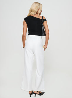 back view of model wearing Princess Polly Jazzar Pocket Detail Pleated Pant White Petite High Waisted Pants 