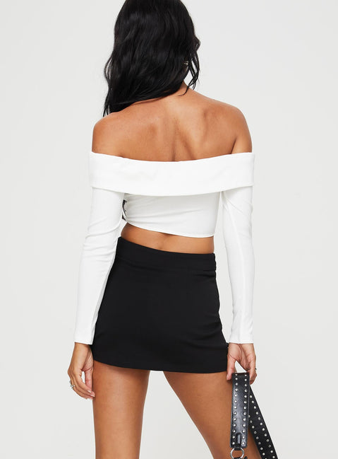 back view of model wearing Princess Polly Ravyn Skort Black Tall High Waisted Shorts 