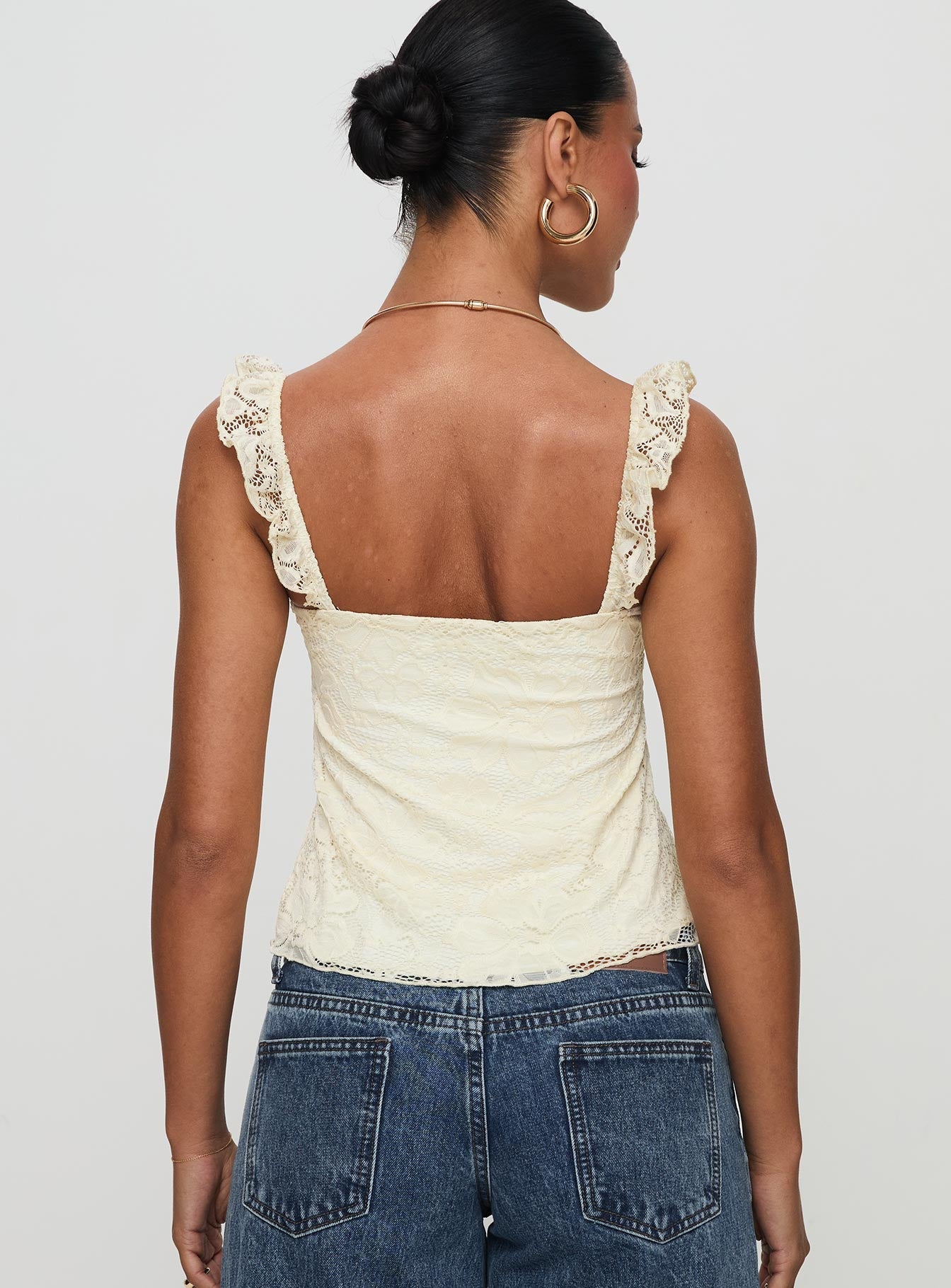back view of model wearing Princess Polly Madaleine Lace Top Cream Sleeveless Square Neck 