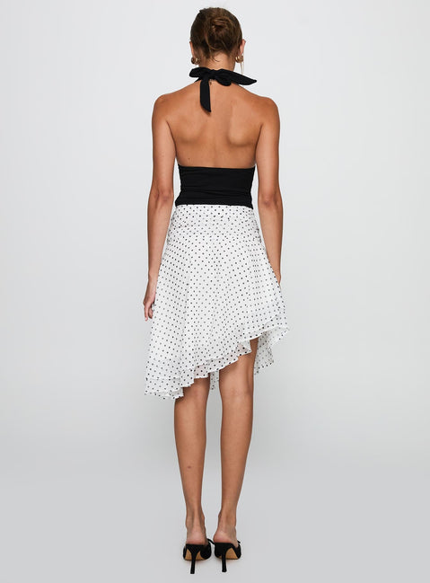 back view of model wearing Princess Polly Evanescence Asymmetrical Midi Skirt White / Polka Dot Midi Skirts 