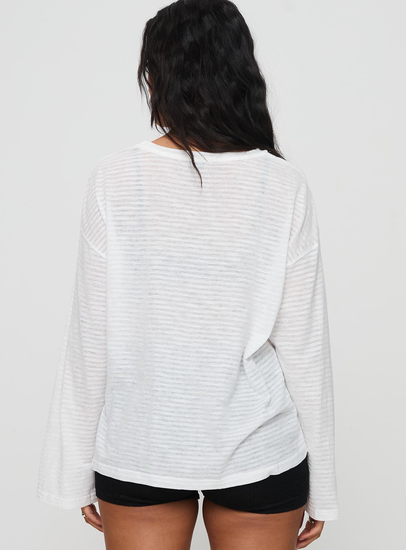 back view of model wearing Princess Polly Veracruz Long Sleeve Top White Full Sleeves Crew Neck 