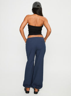 back view of model wearing Princess Polly Zodie Low Waist Pants Navy Low Rise Pants 
