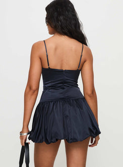 back view of model wearing Princess Polly Dollhouse Mini Dress Navy V-Neck 